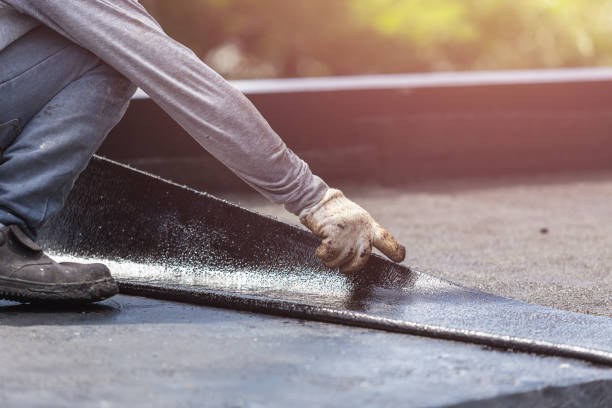 Professional Waterproofing technician working in Ellicott City, MD